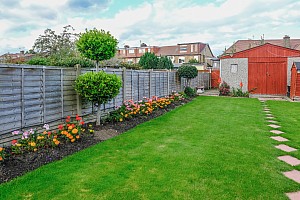 Well established Garden Fencing in a well kept and tidy garden